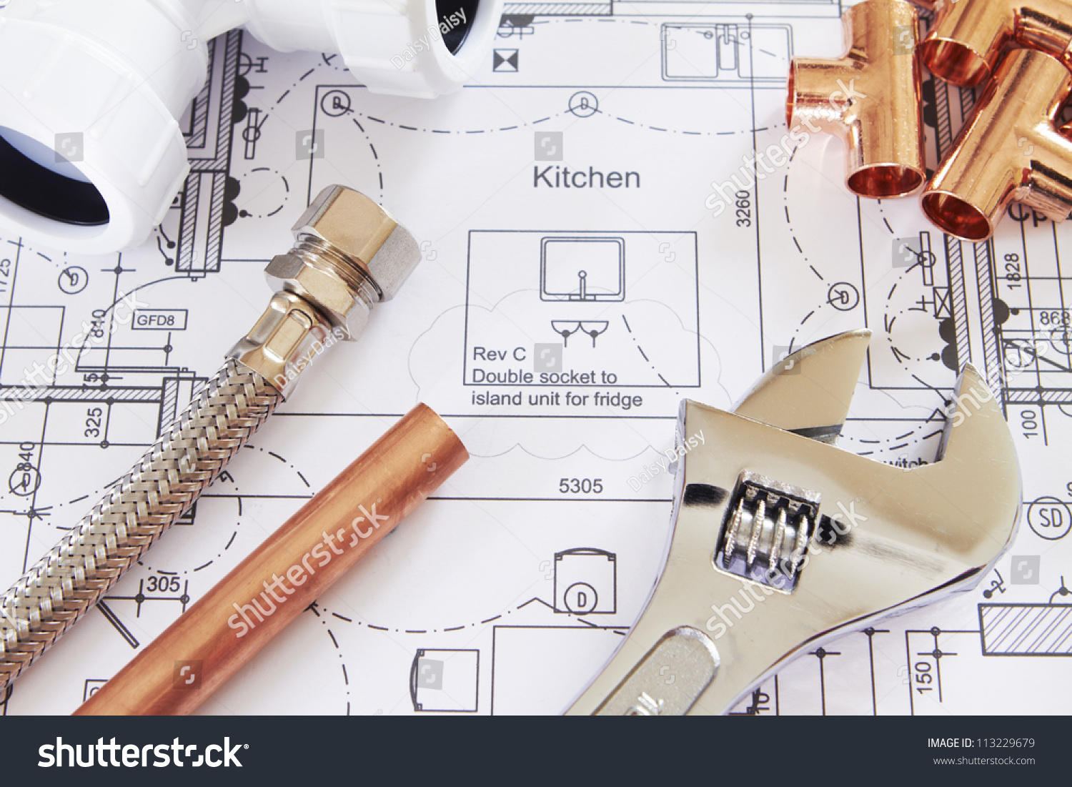 Plumbing Tools Arranged On House Plans #113229679