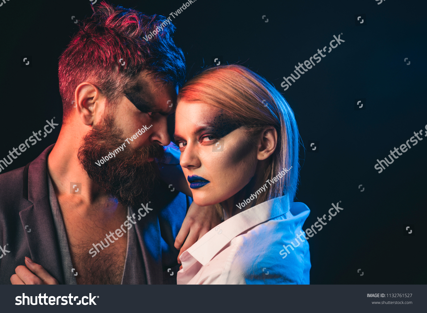 Desire concept. Fashion couple with makeup and stylish hair hug with desire. Beauty and desire. Style you desire. #1132761527