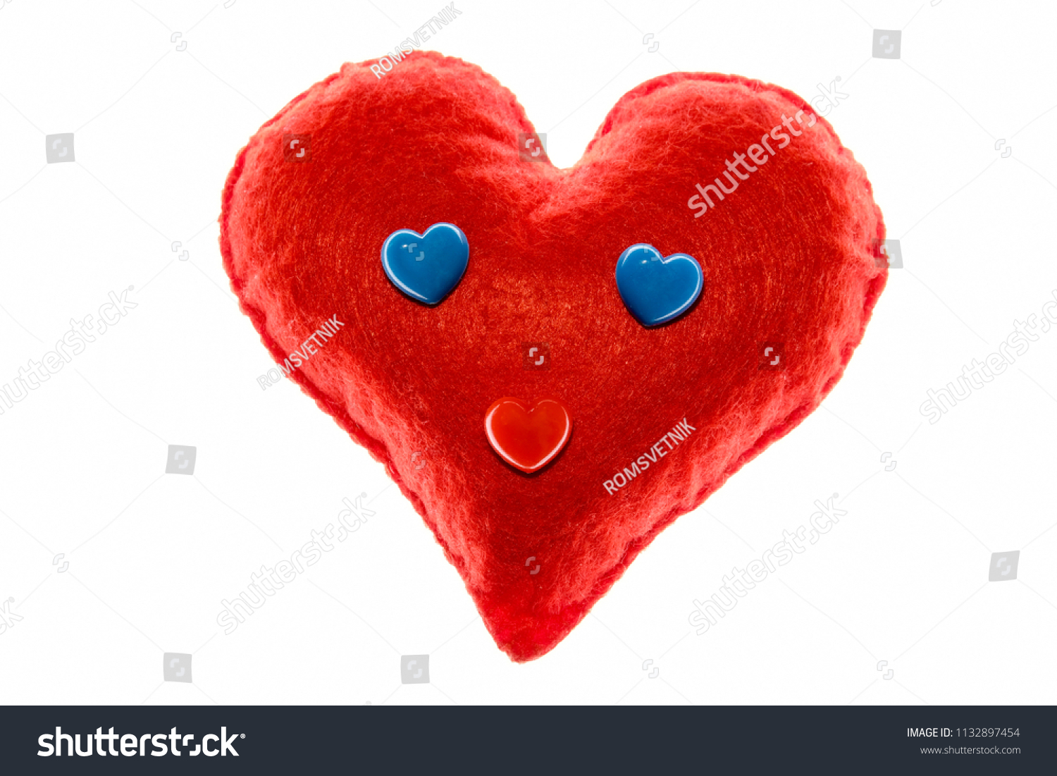 Soft red heart. Emotion with blue eyes. A symbol of love and happiness. Close-up. White background. #1132897454