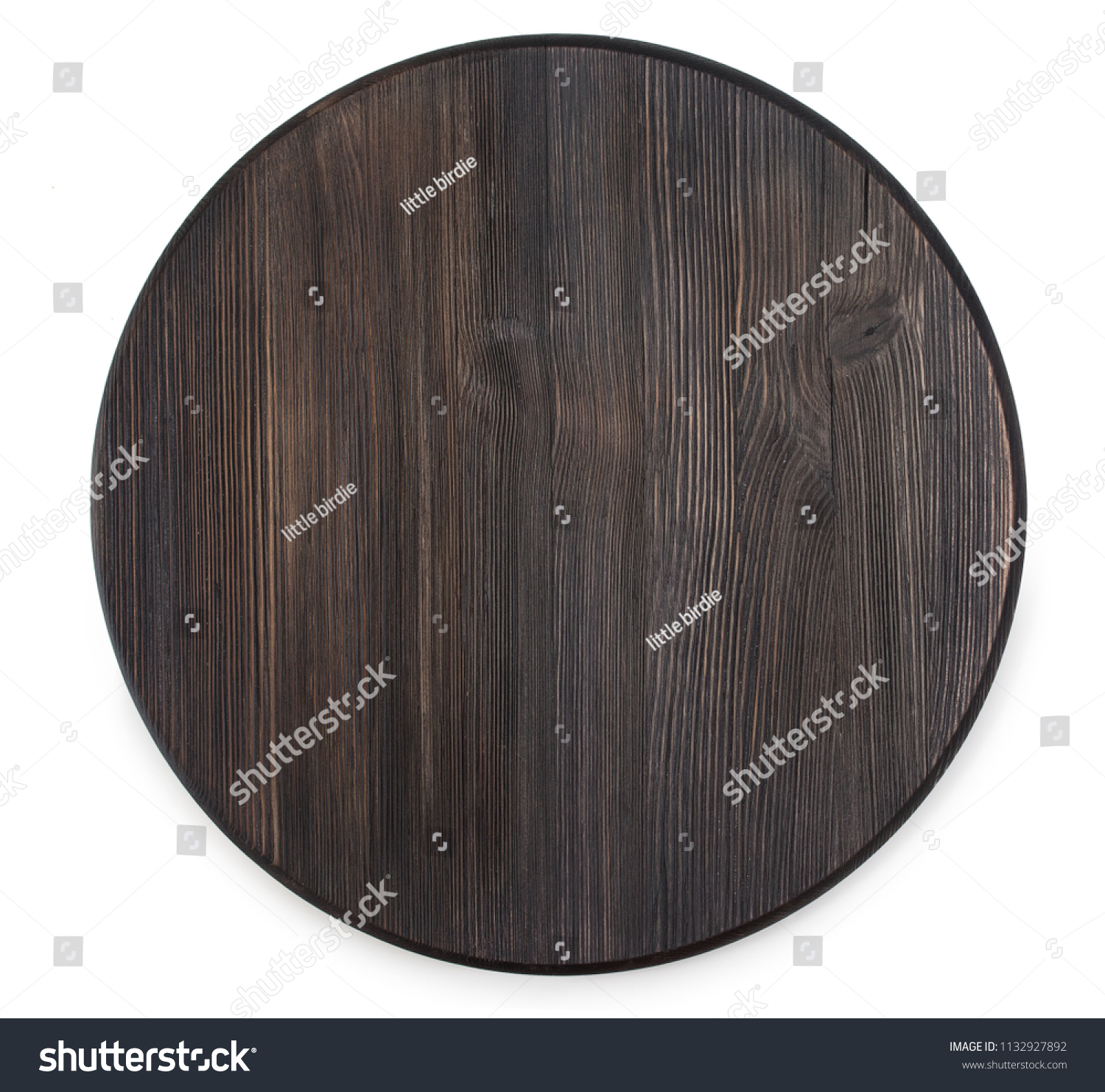 Vintage old textured wooden round cutting board isolated on a white background, top view. #1132927892