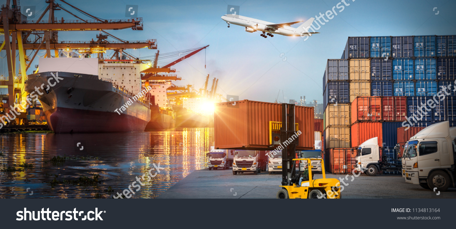 Logistics and transportation of Container Cargo ship and Cargo plane with working crane bridge in shipyard at sunrise, logistic import export and transport industry background #1134813164