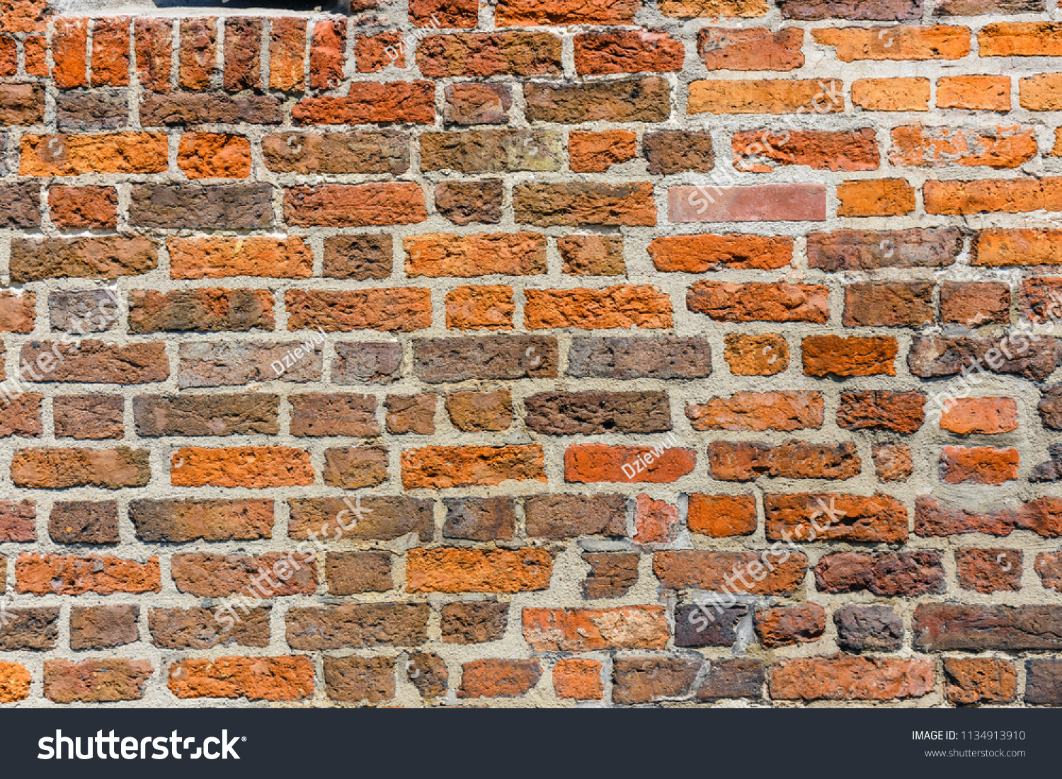 Brown brick wal asl grunge background with copy space #1134913910