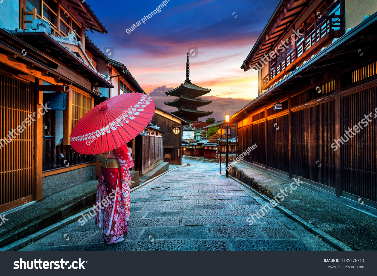 Asian woman wearing japanese traditional kimono at Yasaka Pagoda and Sannen Zaka Street in Kyoto, Japan. #1135776710