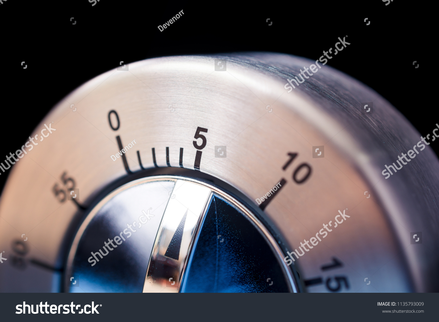 5 Minutes - Macro Of An Analog Chrome Kitchen Timer With Dark Background #1135793009