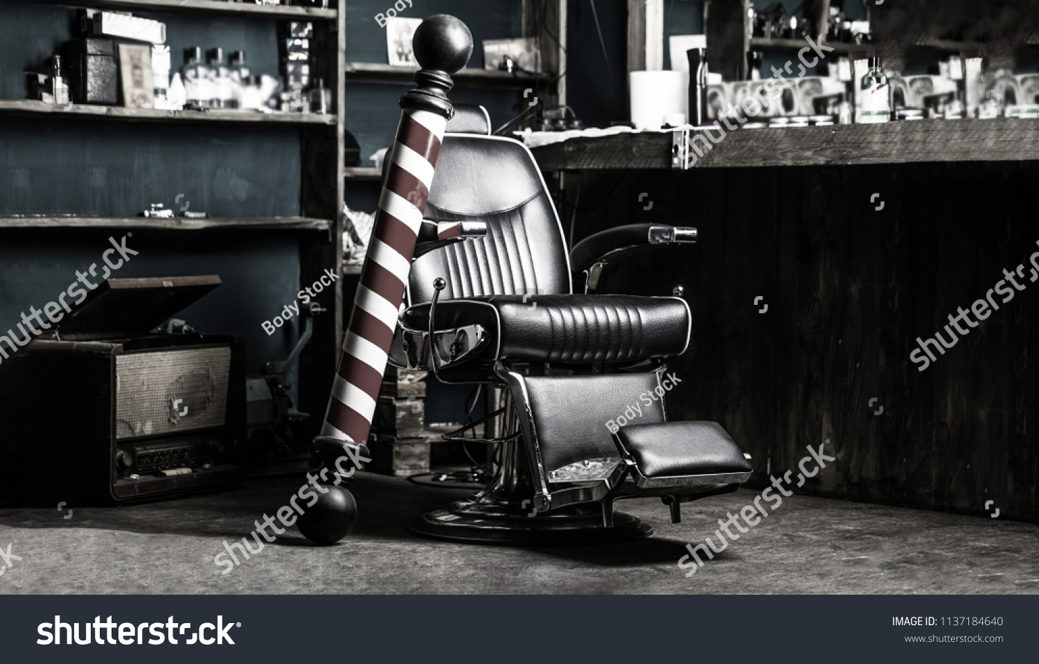 Logo of the barbershop, symbol. Stylish vintage barber chair. Hairstylist in barbershop interior. Barber shop chair. Barbershop armchair, salon, barber shop for men. Barber shop pole. Black and white. #1137184640