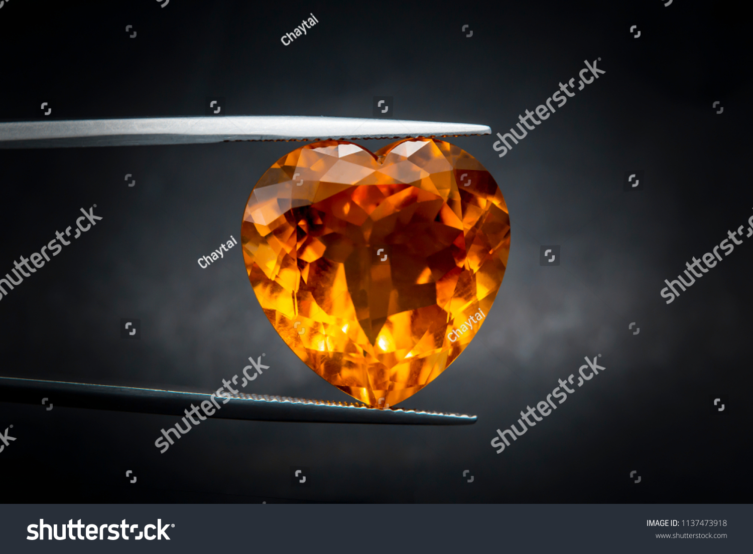 madeira citrine gemstone.The color of Madeira golden-orange to reddish-brown.Dark, pretty big expensive.heart-shaped
 #1137473918