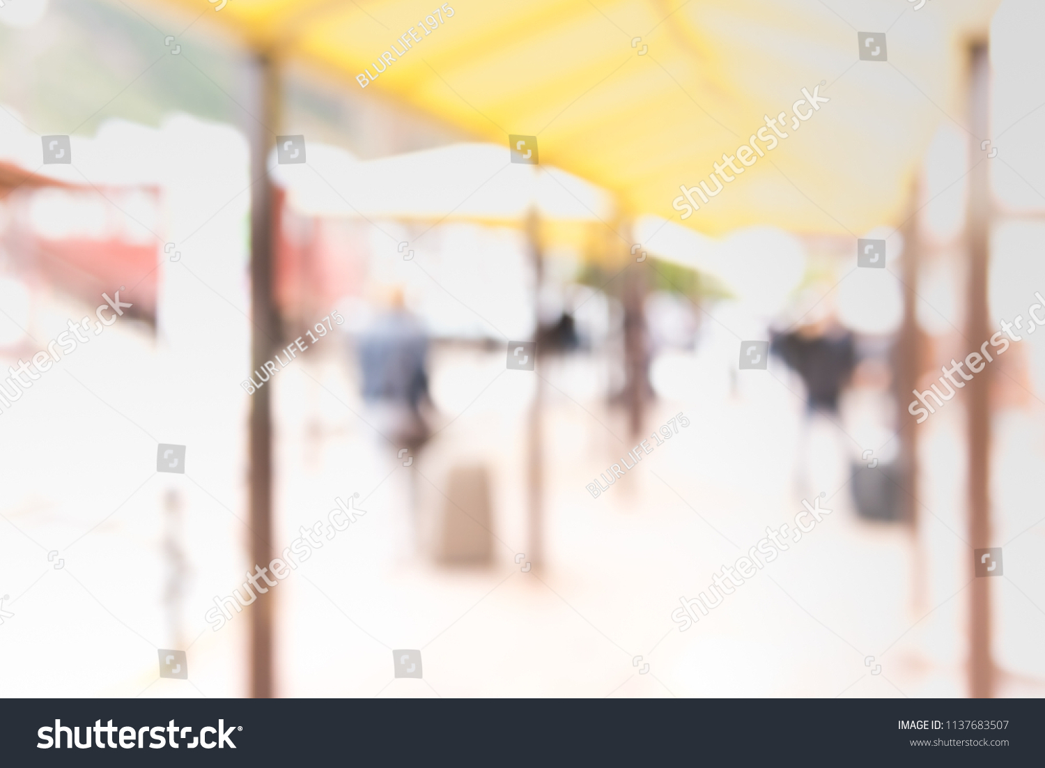 Blurred people at waiting zone in airport or bus station with bokeh for background usage . (vintage tone) #1137683507