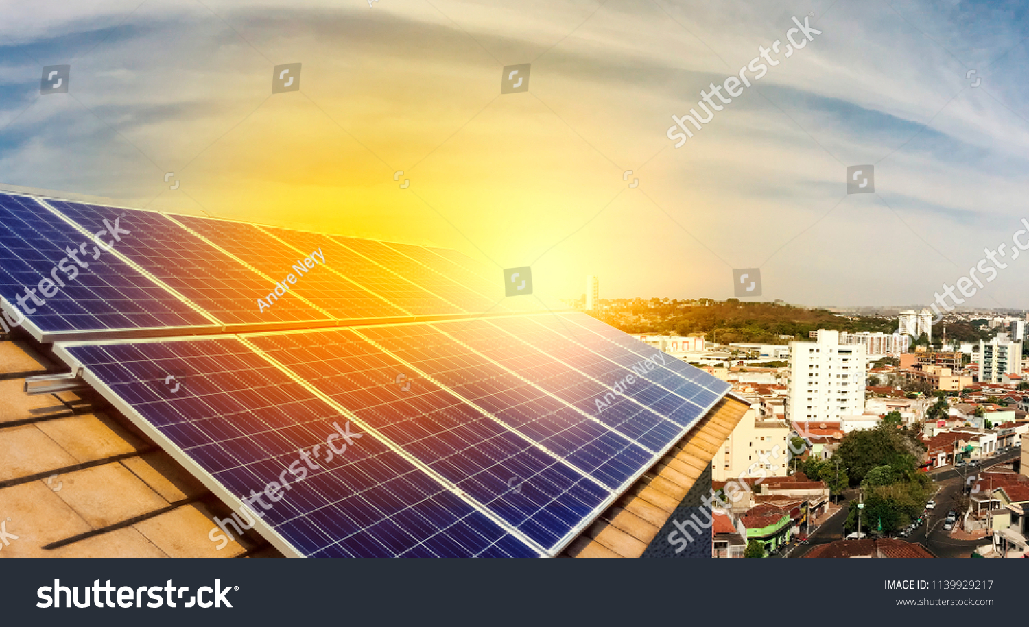 Photovoltaic power plant on the roof of a residential building on sunny day - Solar Energy concept of sustainable resources #1139929217