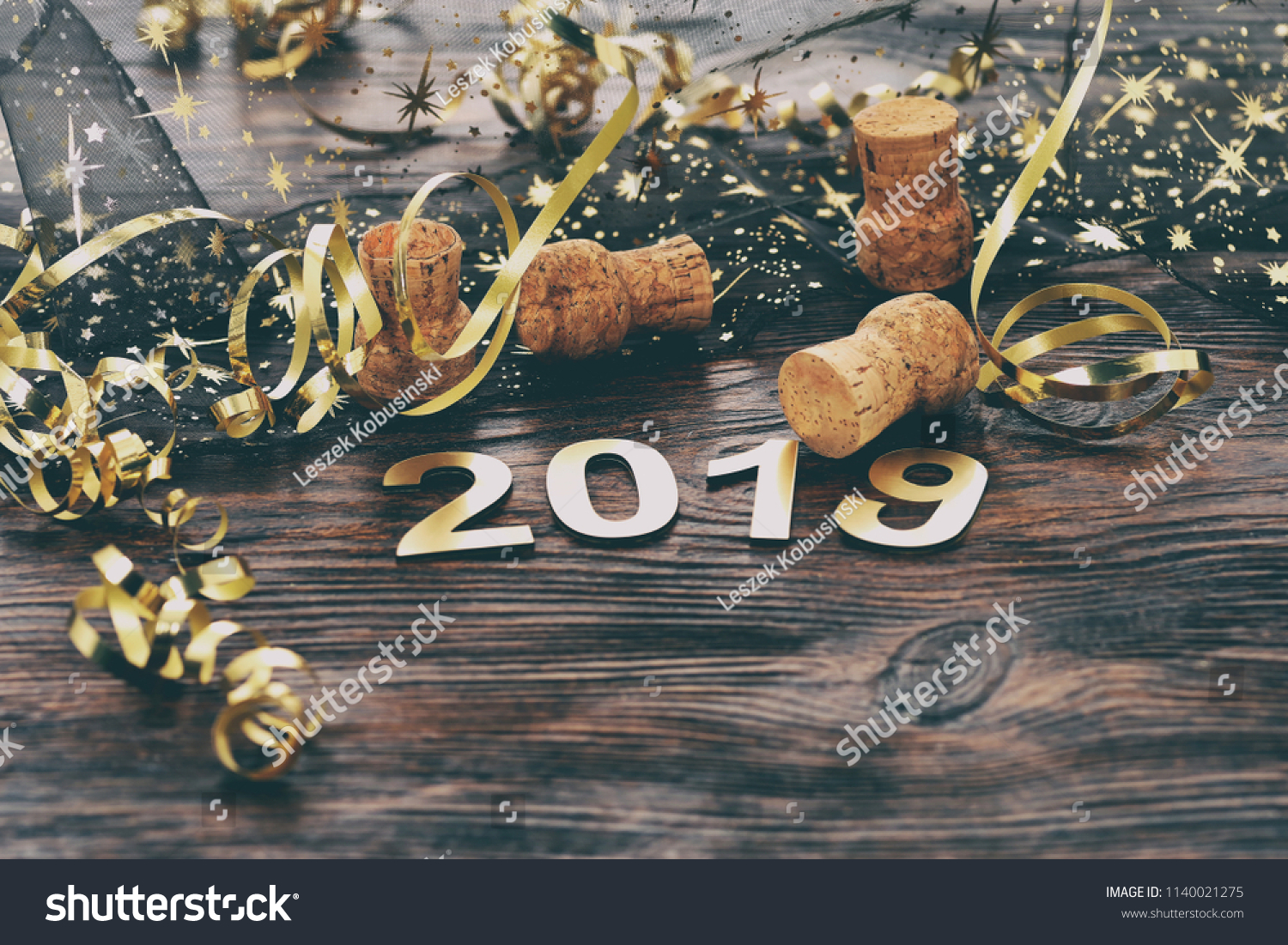 Happy New Year 2019. Symbol from number 2019 on wooden background.  #1140021275