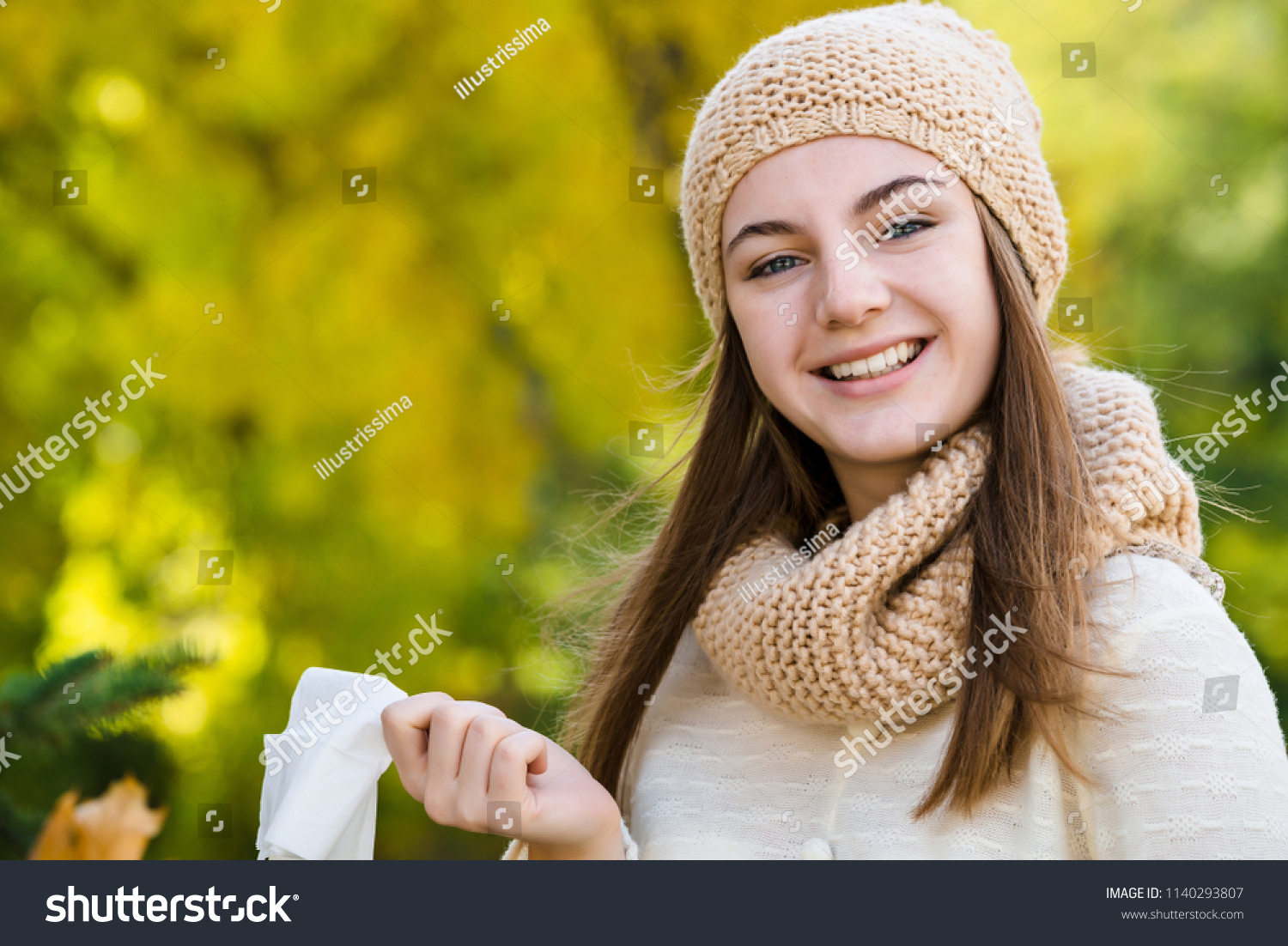 No ill no allergy. Woman throws out a handkerchief on autumn bac #1140293807