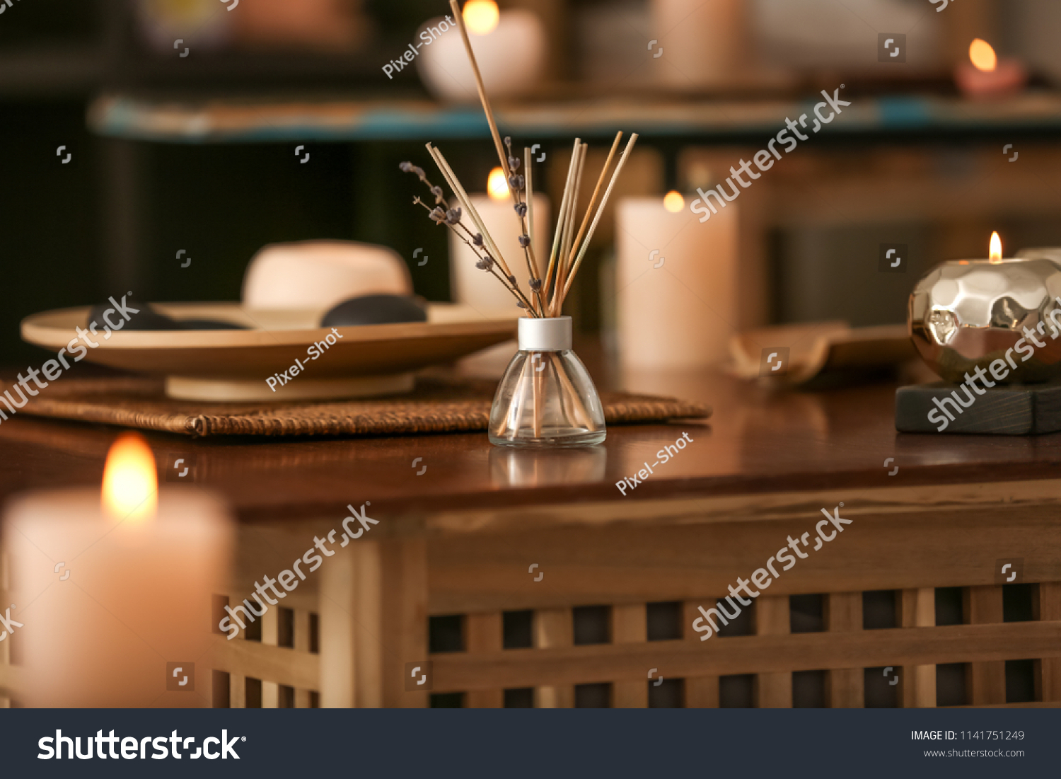 Aroma sticks on table in spa salon #1141751249