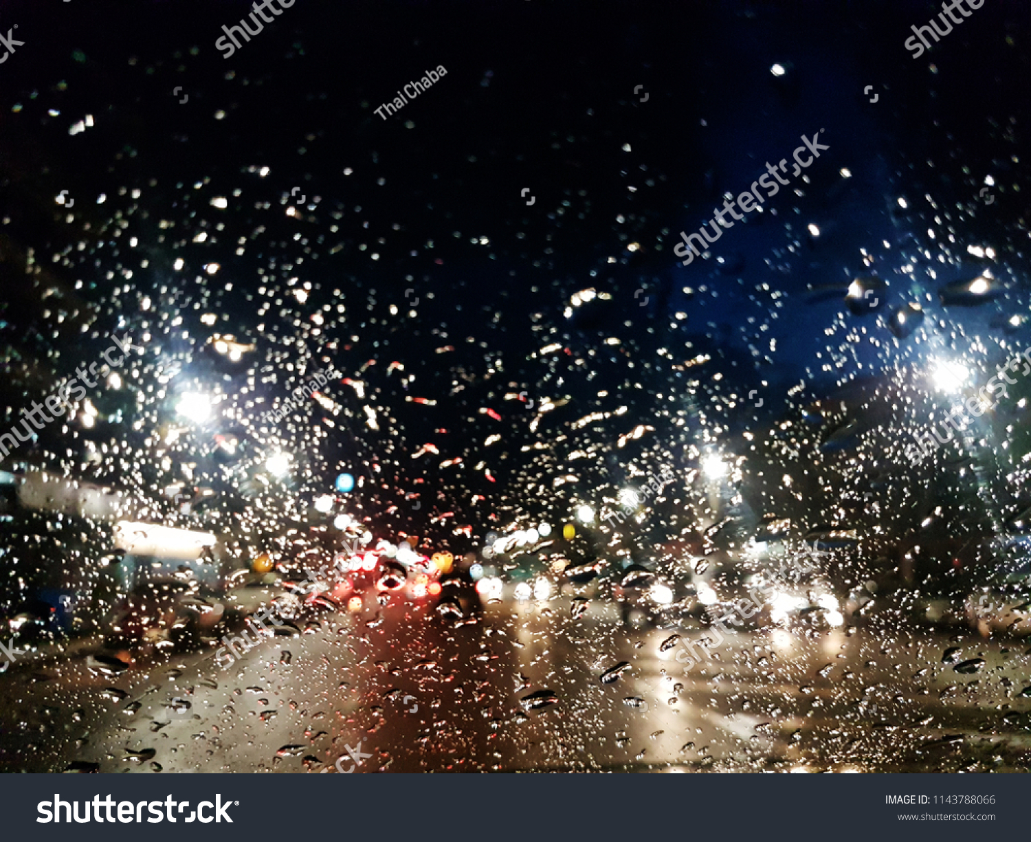 Rain On the glass Background bokeh . of colorful lights for use as illustrations in art and design #1143788066