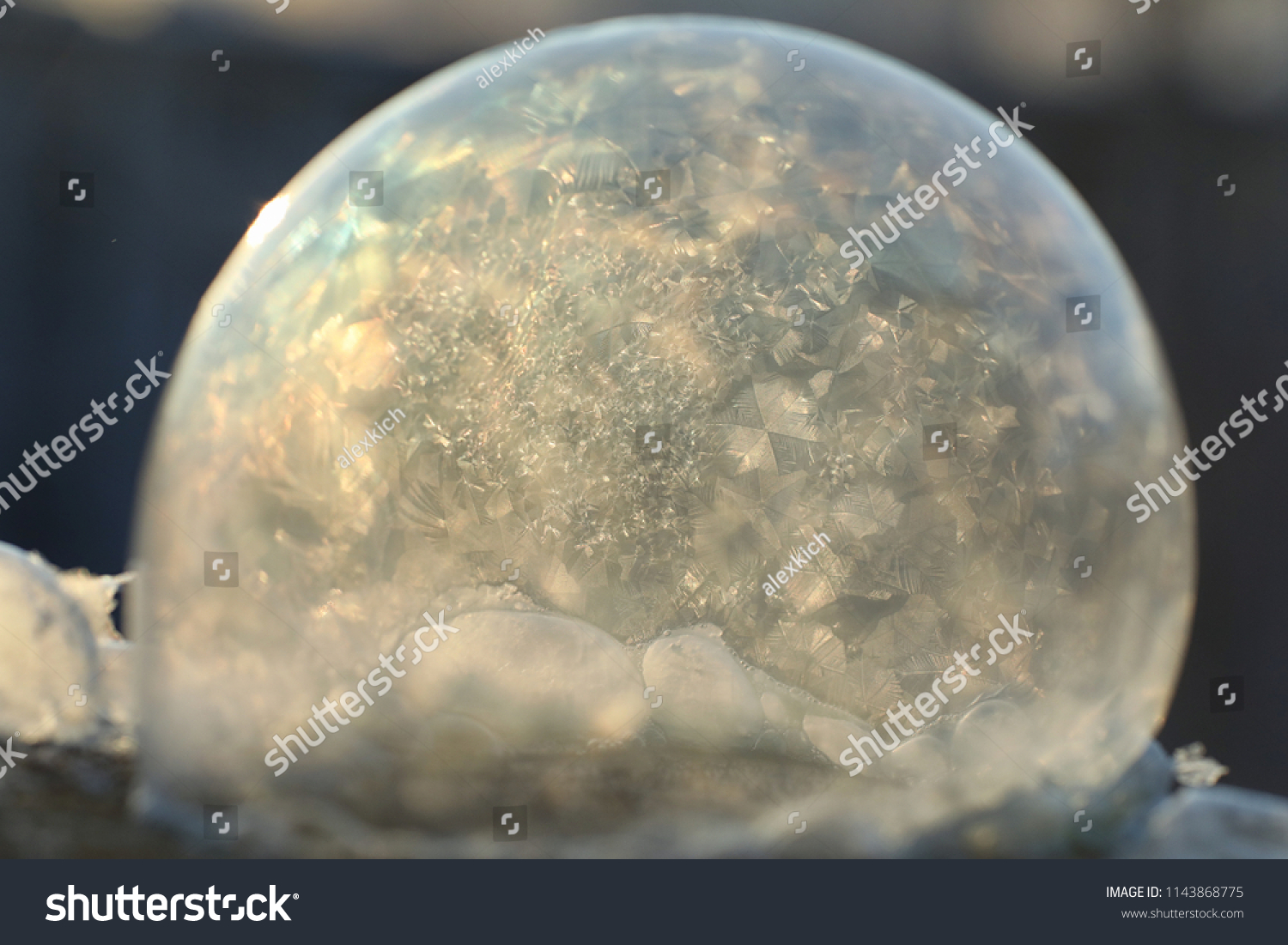 Soap bubbles freeze in the cold. Winter soapy water freezes in air.
 #1143868775