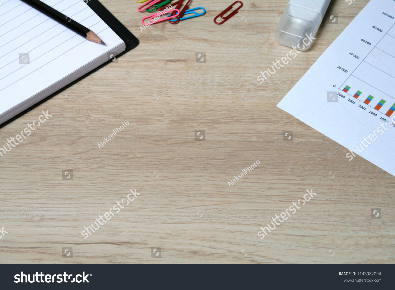 Office desktop with office accessories, Desktop with business objects. Business objects on wood work table. #1143982094