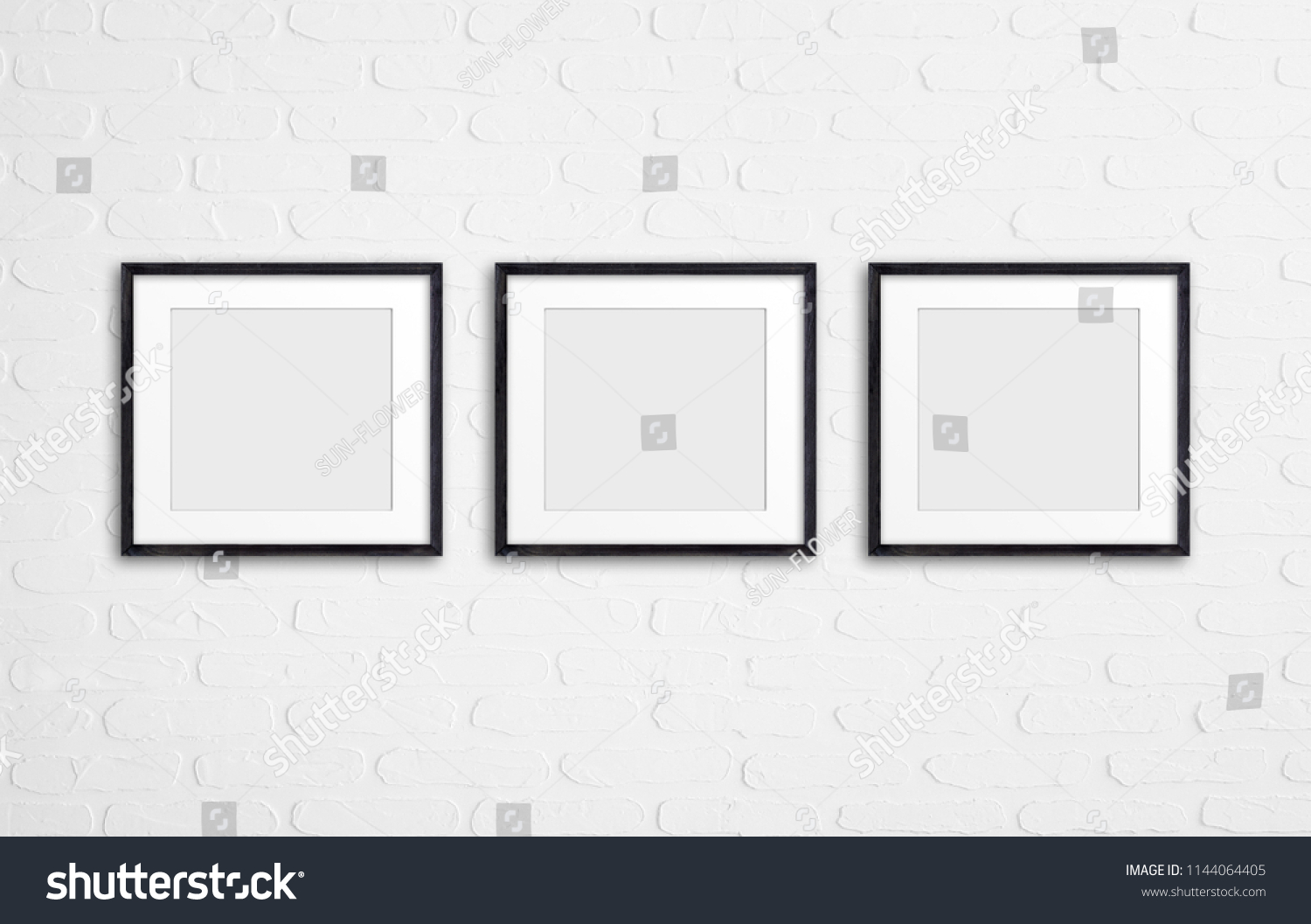 Photo frames collage mockup on white bricks wall background #1144064405