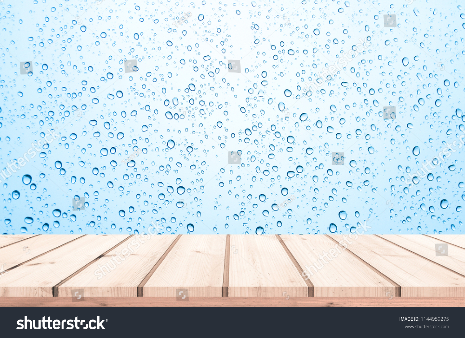 Wood plank with abstract water drop on glass background for product display  #1144959275