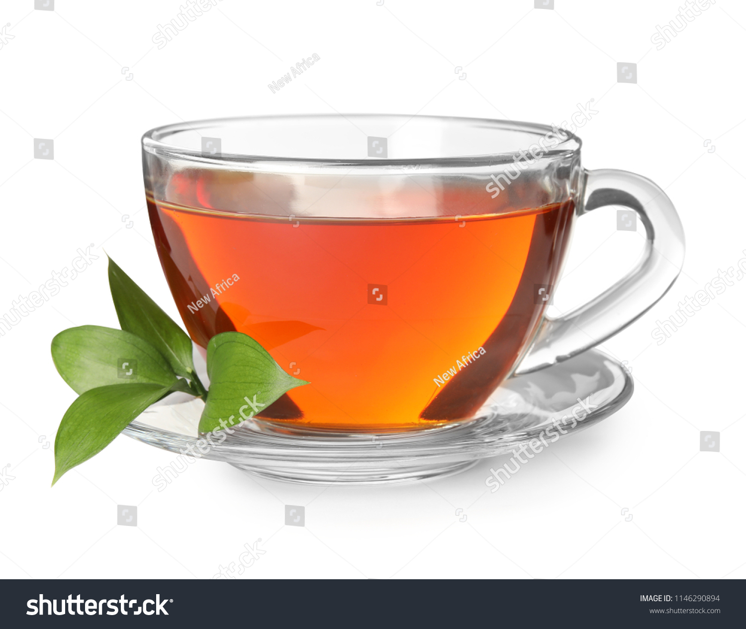 Glass cup of hot aromatic tea on white background #1146290894