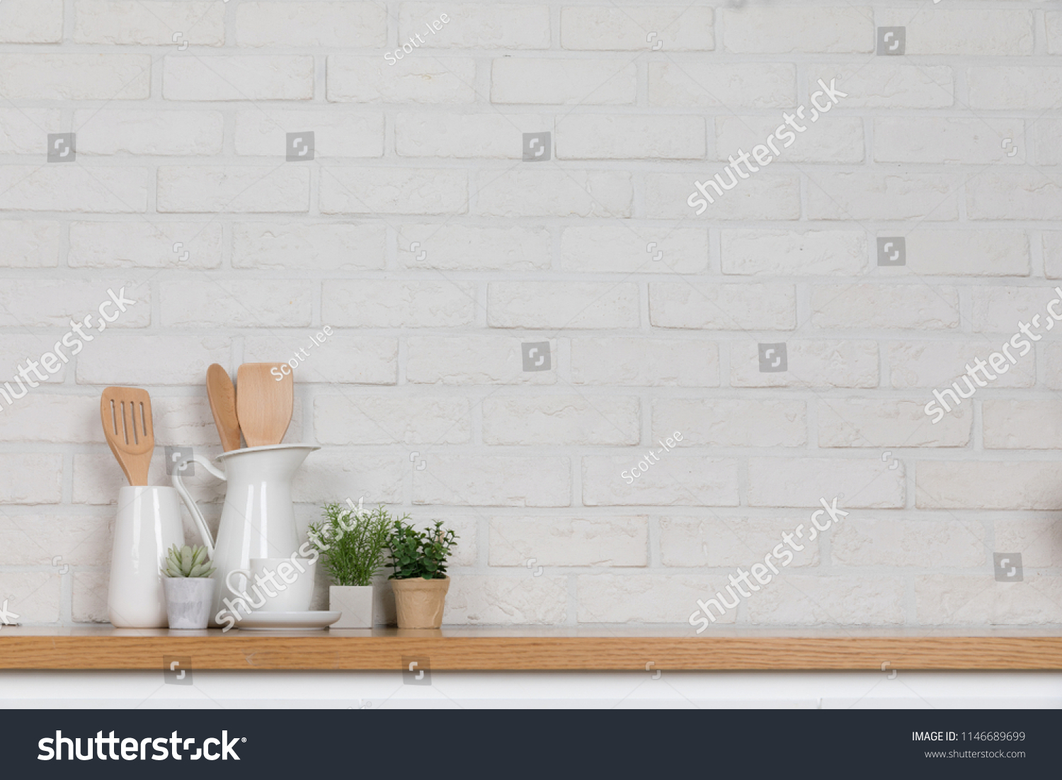 Kitchen utensils and dishware on wooden shelf. Kitchen interior background.Text space. #1146689699