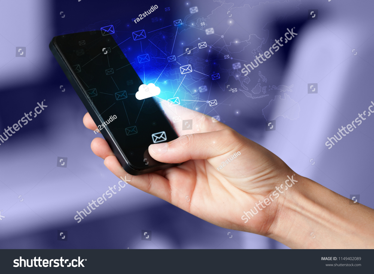 Hand using phone with cloud computing and online storage concept #1149402089