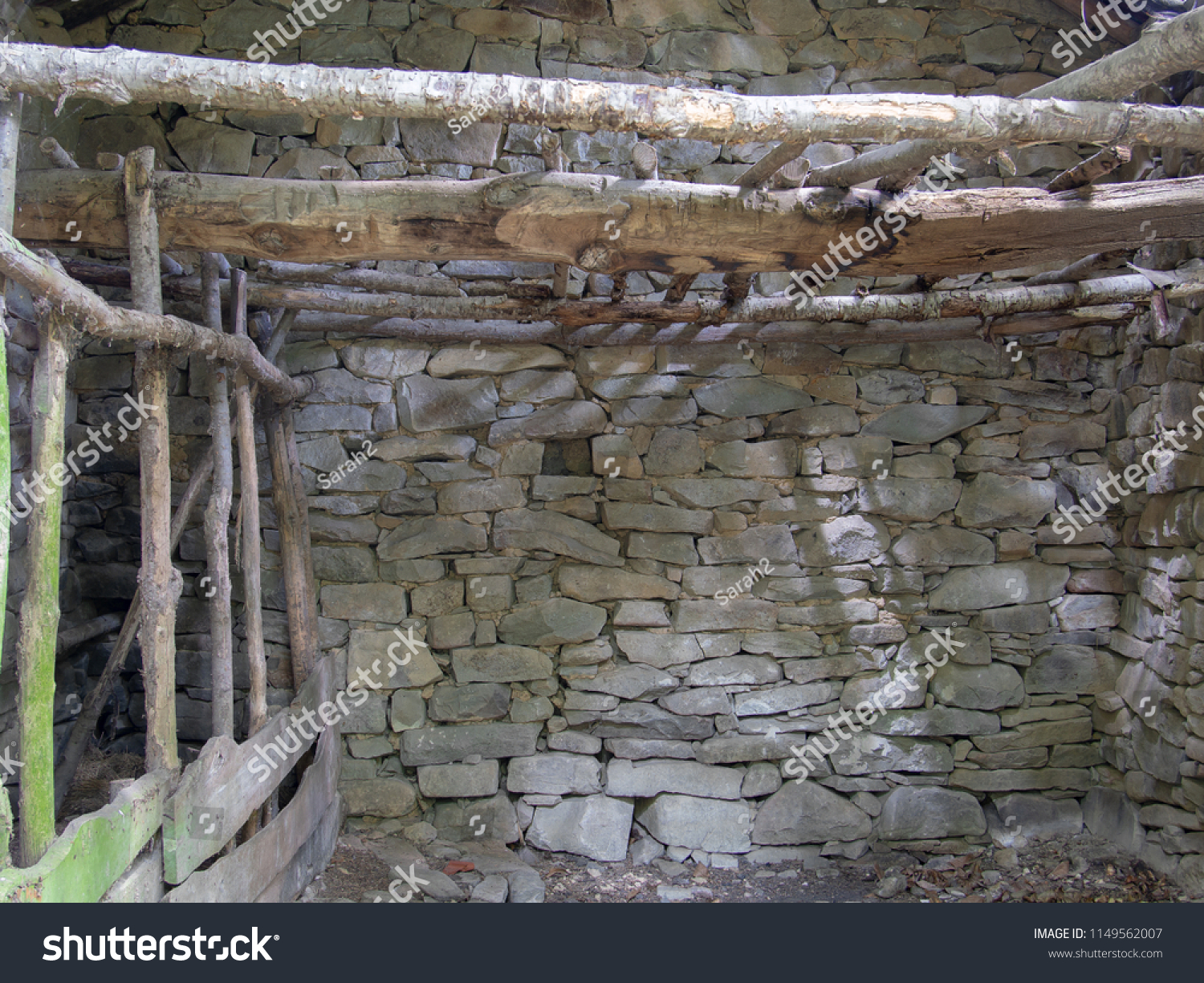 Old abandoned small barn, agricultural building in Italy. Rustic detail background. Animal stalls. #1149562007