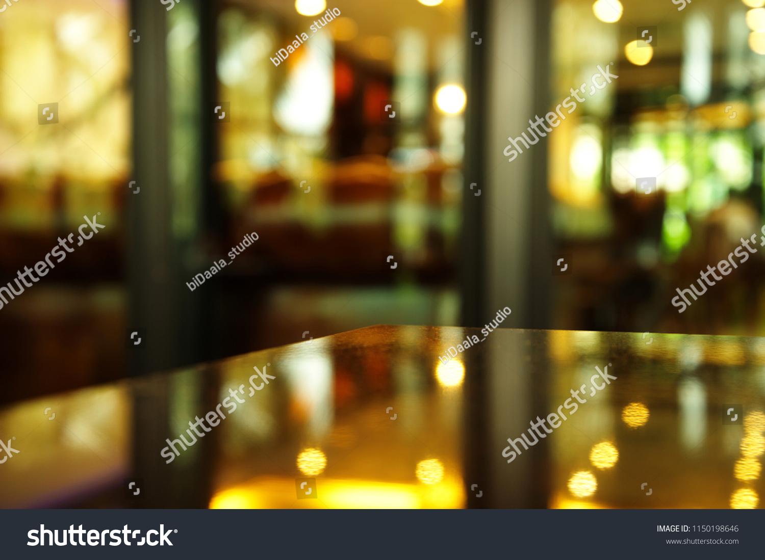 corner of table reflection night light with blur background of pub or bar  #1150198646