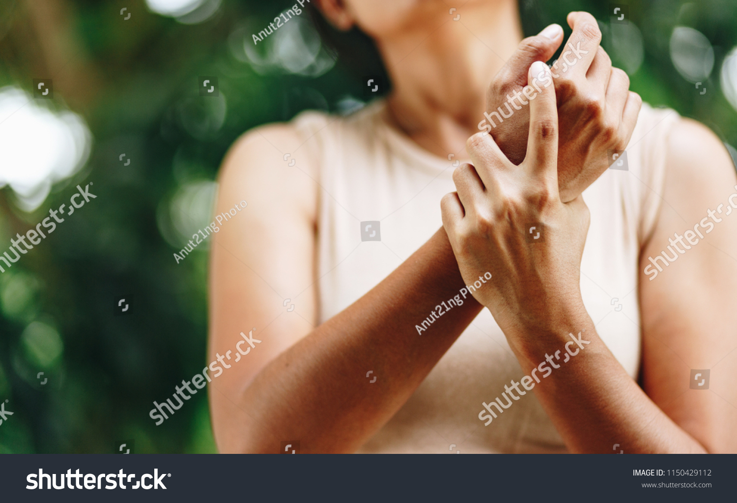 Close up Woman wrist pain , office syndrome , health care concept #1150429112