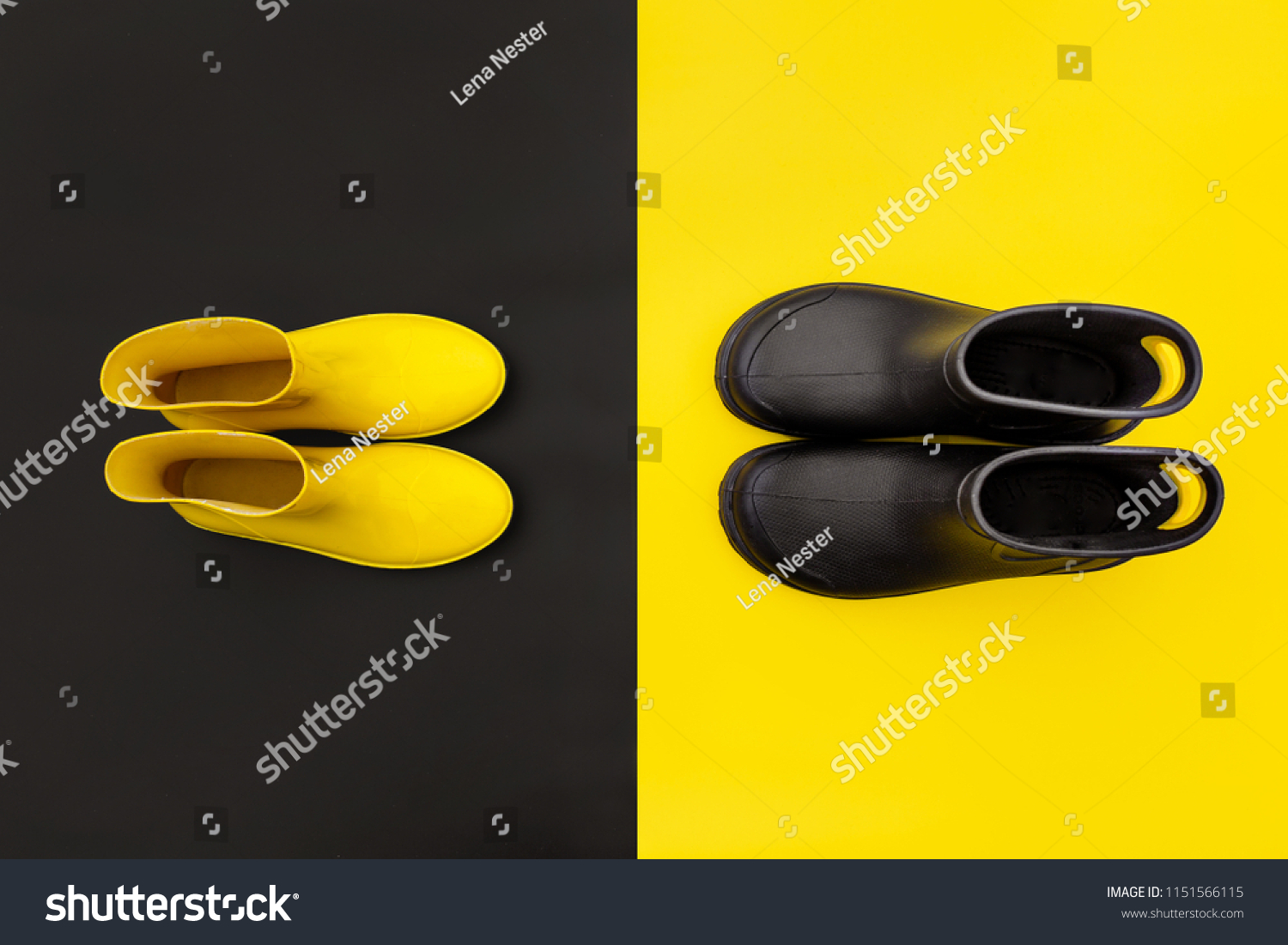 Two pairs of gumboots - yellow female and black male - standing opposite to each other on the inverse backgrounds. Top view. The concept of He and She #1151566115