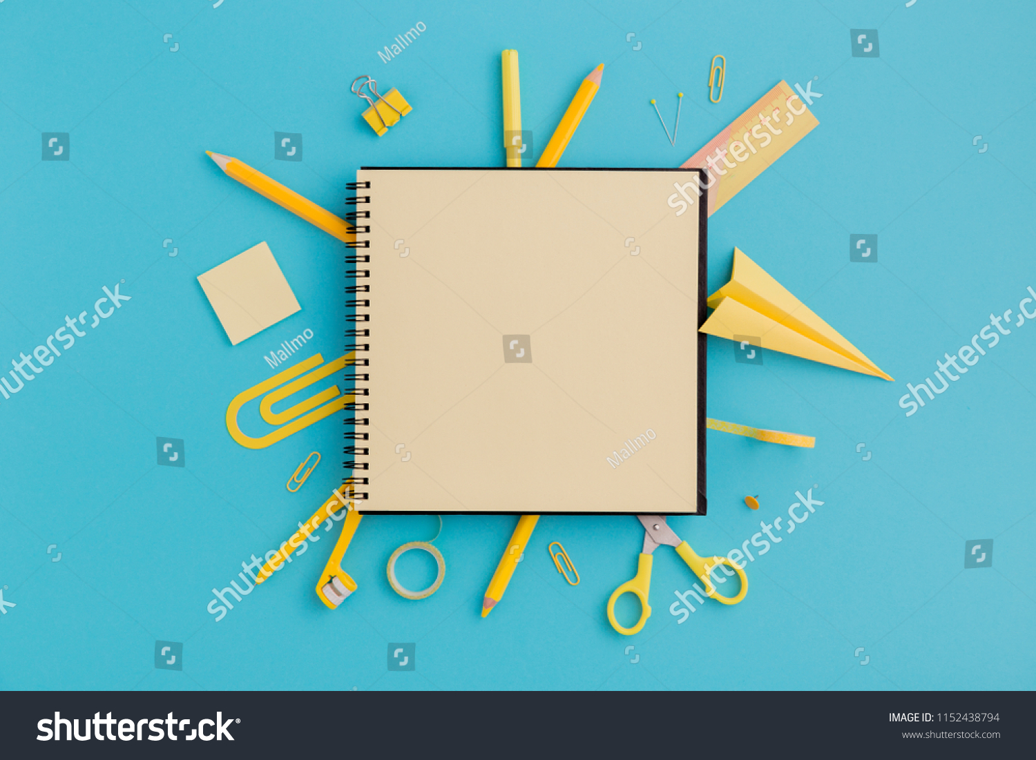 School notebook and various stationery. Back to school concept. Creative flat lay desk. #1152438794