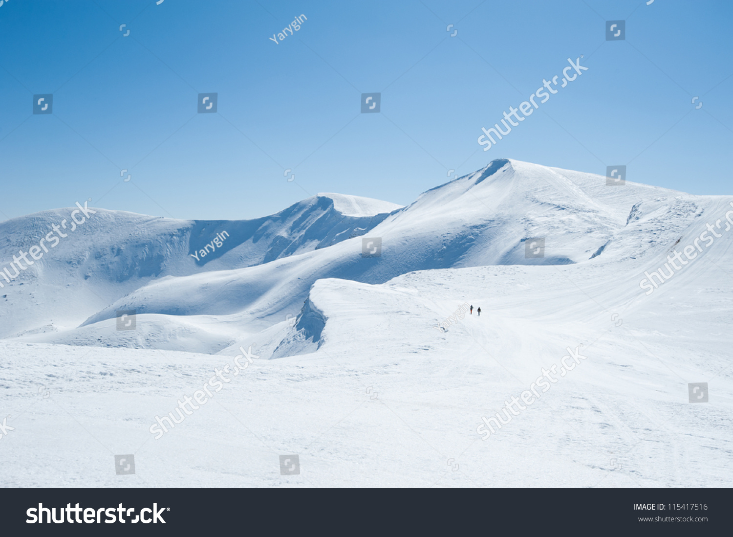 Winter snow covered mountain peaks in Europe. Great place for winter sports #115417516