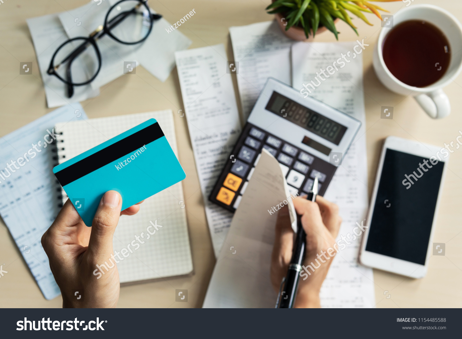 Stressed young woman calculating monthly home expenses, taxes, bank account balance and credit card bills payment, Income is not enough for expenses. #1154485588