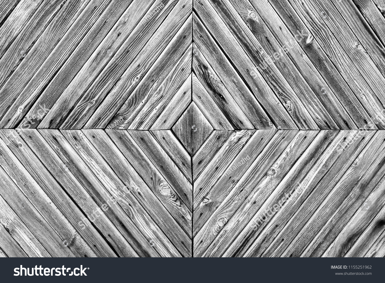 A diamond-shaped pattern of the old wooden boards,black and wite background #1155251962