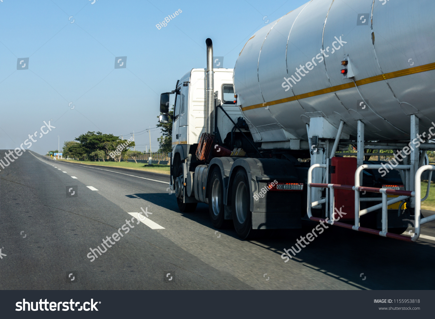 Gas Truck on highway road with tank oil  container, transportation concept.,import,export logistic industrial Transporting Land transport on the asphalt expressway with blue sky #1155953818