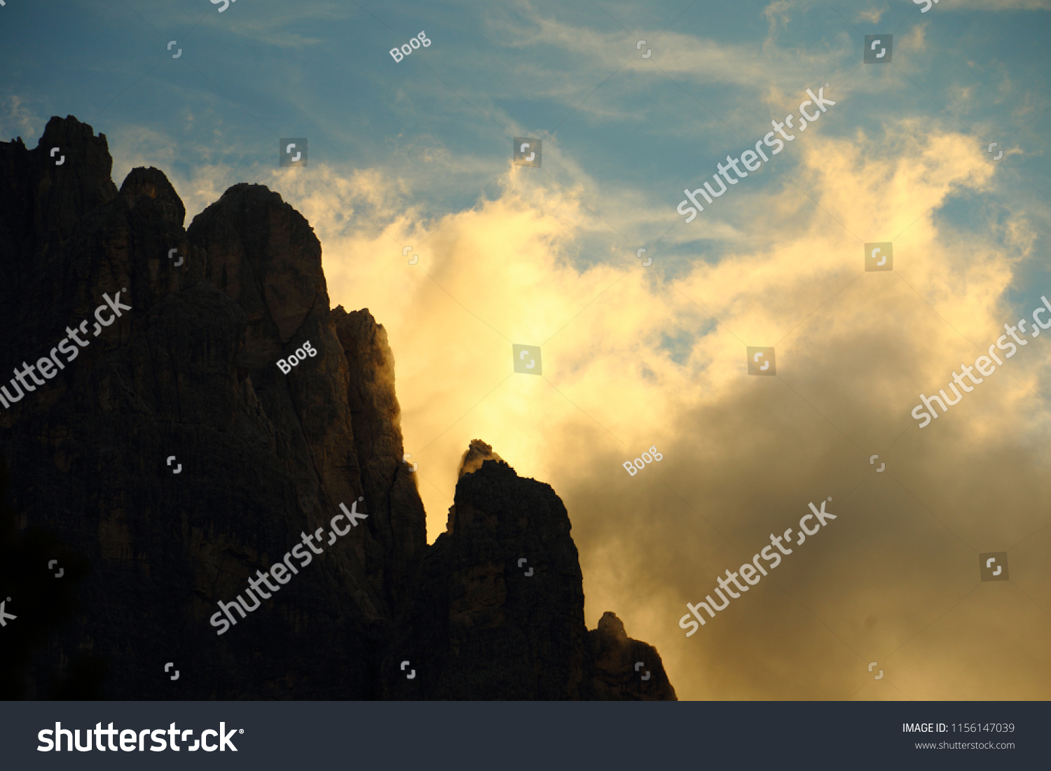 Rock ridges against a cloudy sky #1156147039