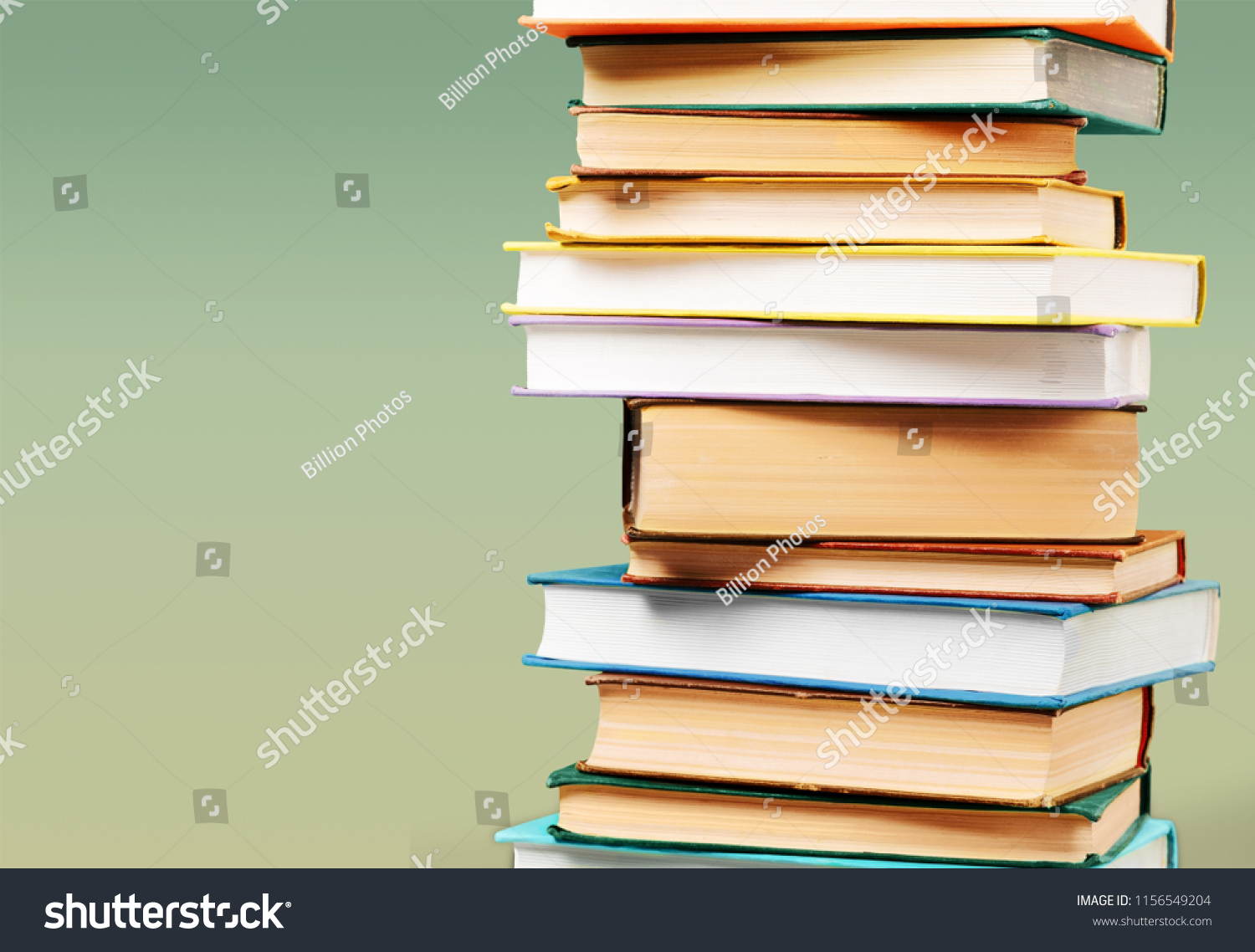 Collection of old books vertical stack #1156549204