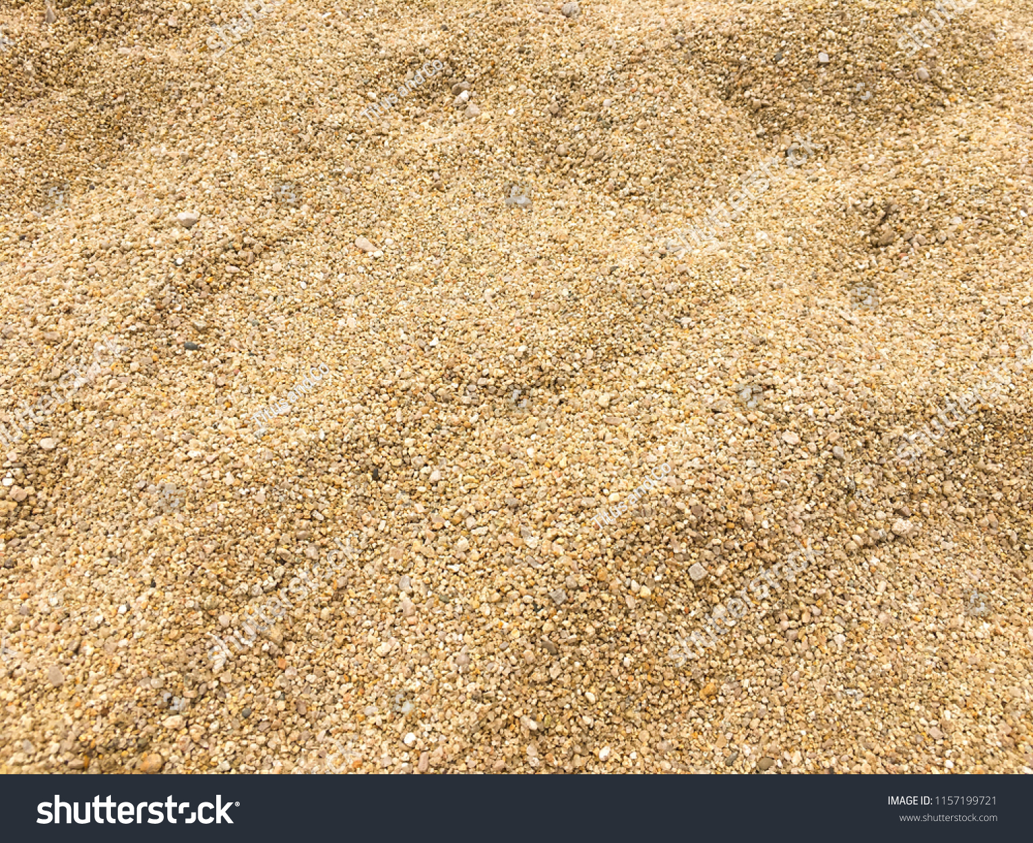 Small sea pebbles background, gravel. Stones pebble background texture. #1157199721