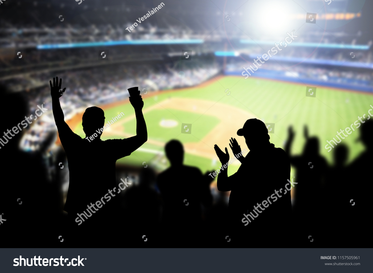Baseball fans and crowd cheering in stadium and watching the game in ballpark. Happy people enjoying a match and sport event in arena. Friends watching ballgame live. #1157505961
