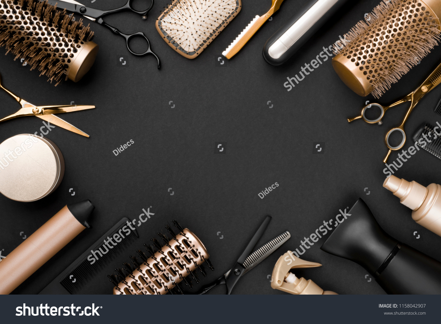 Hairdresser tools on black background with copy space in center