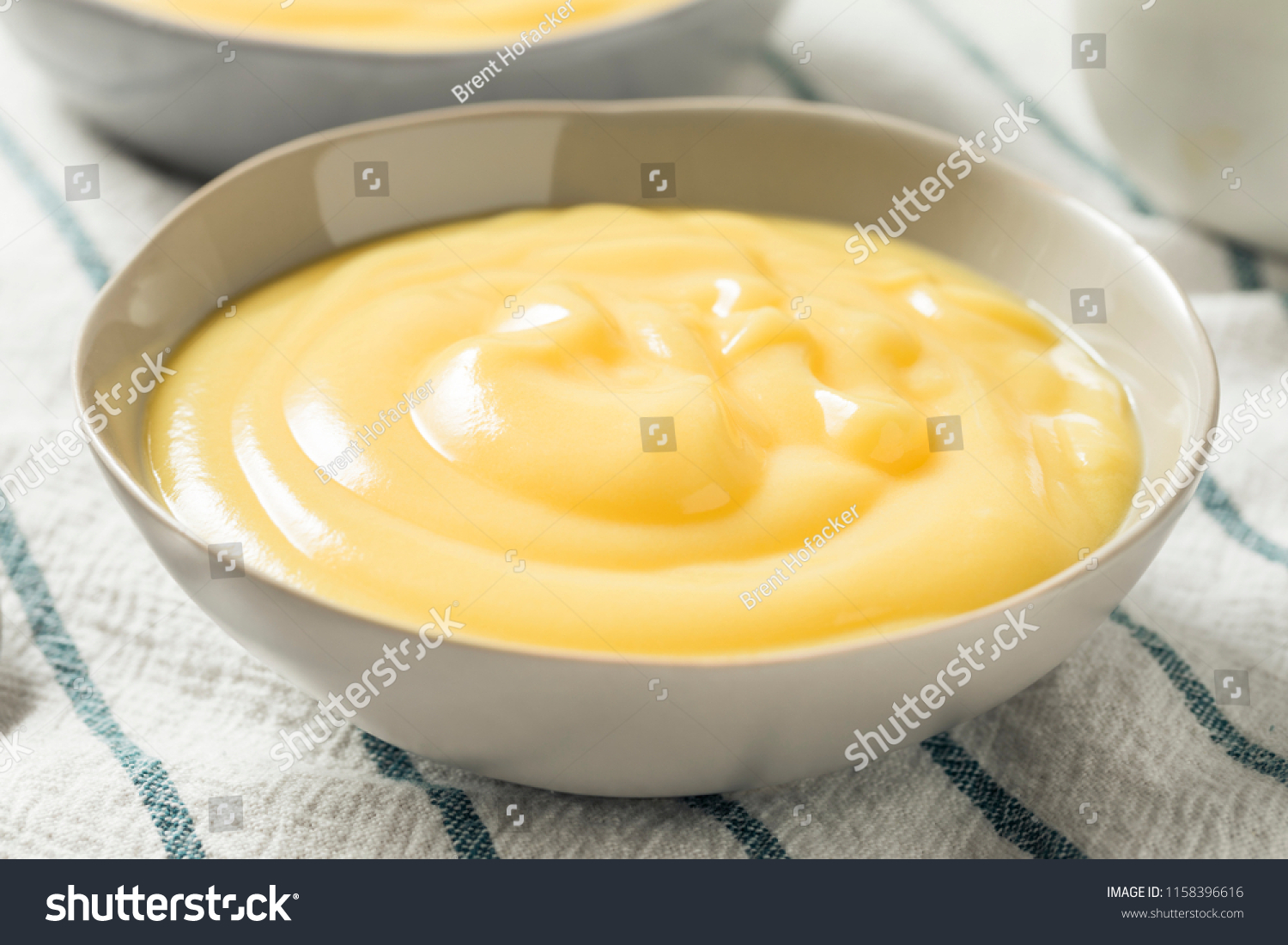 Homemade Vanilla Custard Pudding in a Bowl #1158396616
