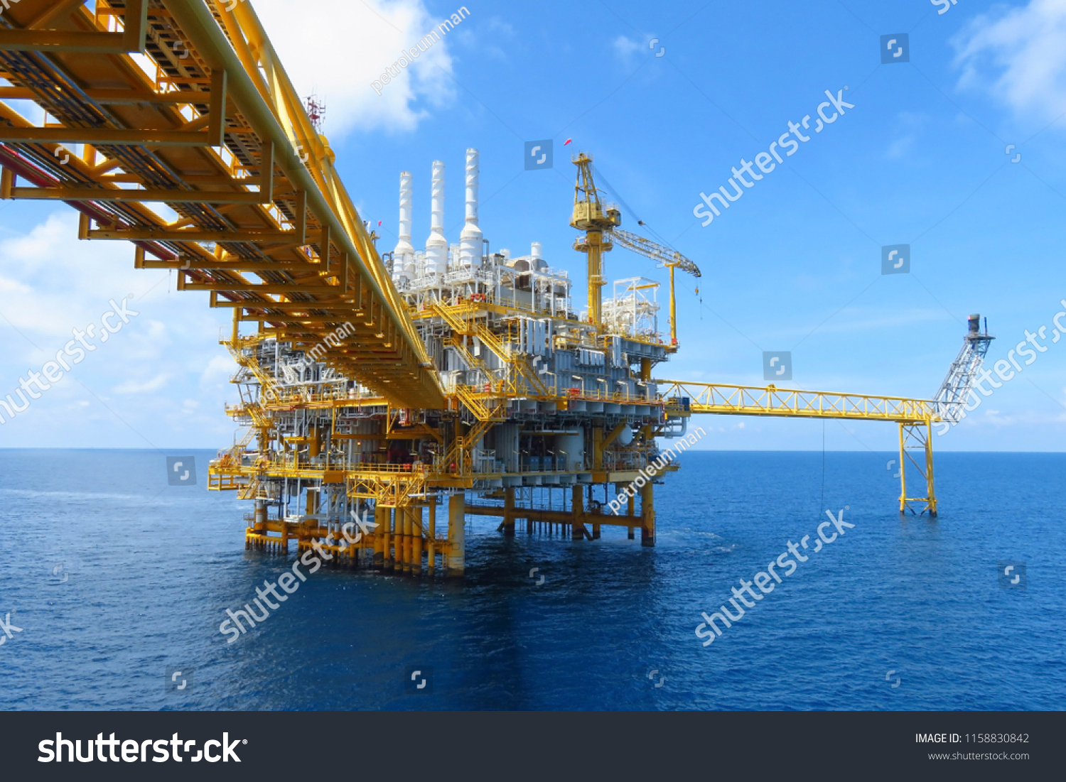 Offshore construction platform for production oil and gas, Oil and gas industry and hard work,Production platform and operation process by manual and auto function, oil and rig industry and operation. #1158830842