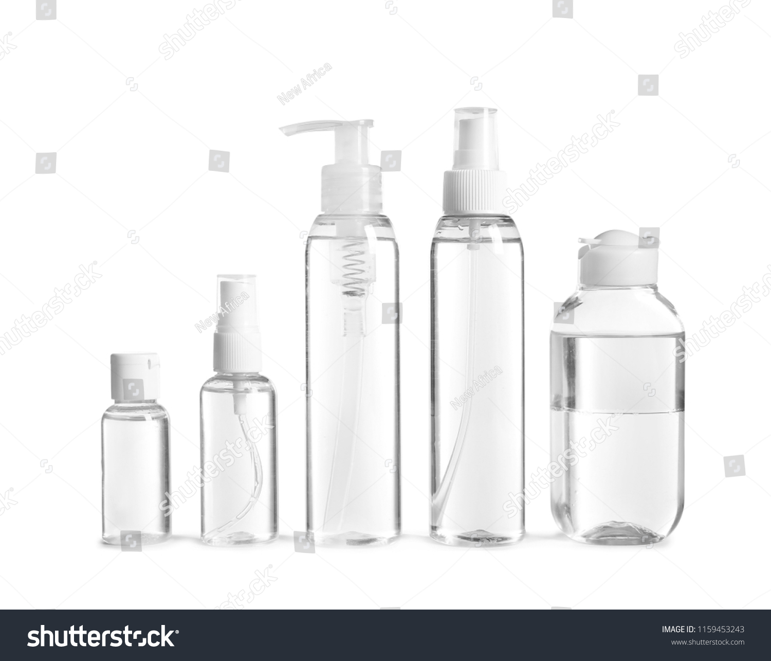 Different cosmetic bottles on white background #1159453243