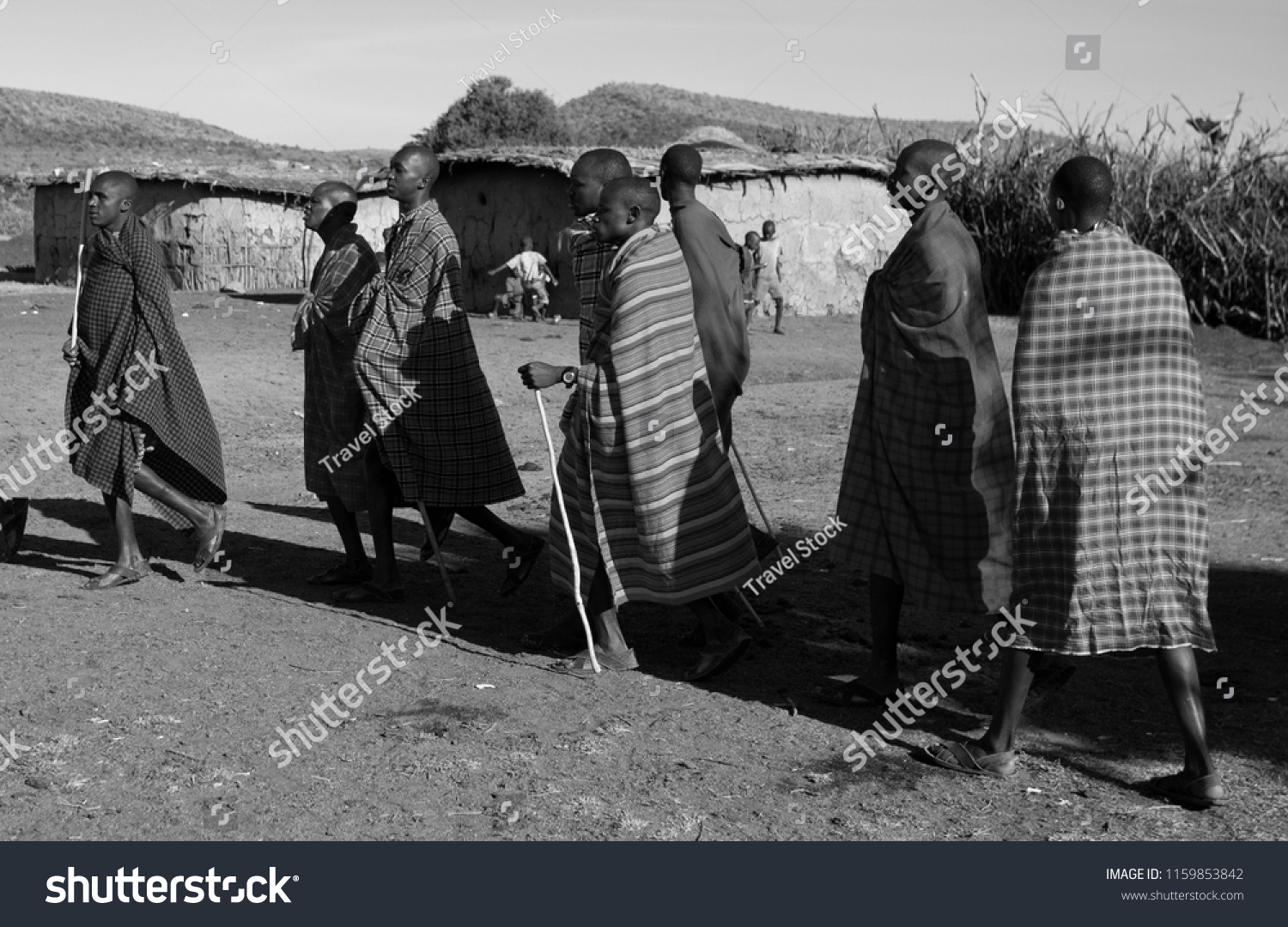 Unidentified Maasai men on Oct 15, 2012 in the Maasai Mara, Kenya. Maasai are a Nilotic ethnic group of semi-nomadic people located in Kenya and northern Tanzania. #1159853842