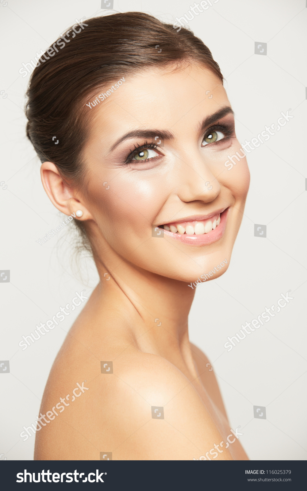 Close up portrait of beautiful young woman face. Isolated on white background. Portrait of a female model. #116025379