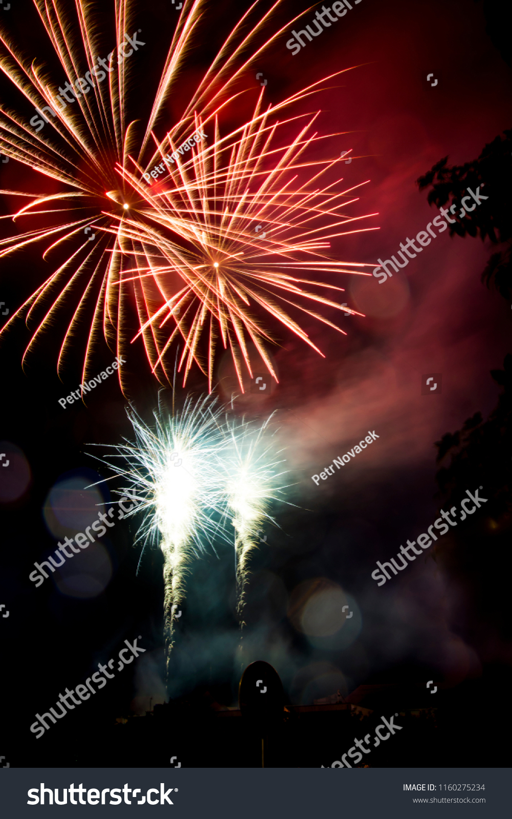 Red firework. Amazing fireworks, fireworks 2019, fireworks background, fireworks event, Celebration in the town. #1160275234