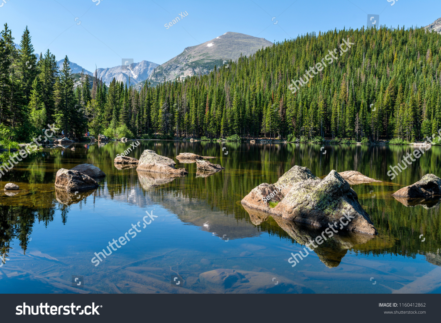 Bear Lake - A sunny summer morning view of a rocky section of Bear Lake, Rocky Mountain National Park, Colorado, USA. #1160412862