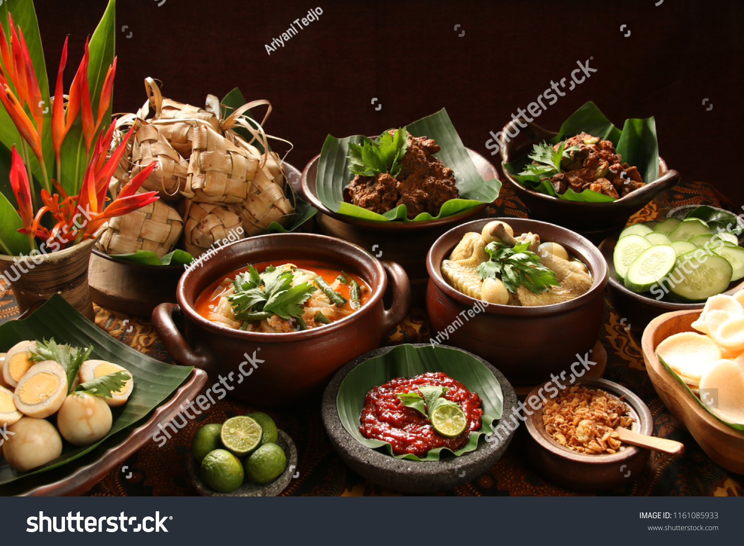 Ketupat Lebaran. Traditional celebratory dish of rice cake with several side dishes, popularly served during Eid celebrations. #1161085933