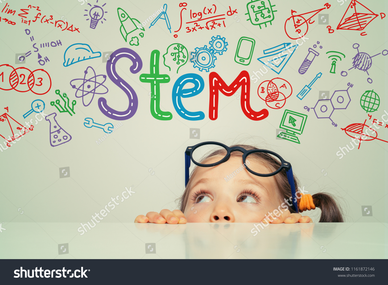STEM word and symbols over beautiful cute little girl. modern education concept #1161872146