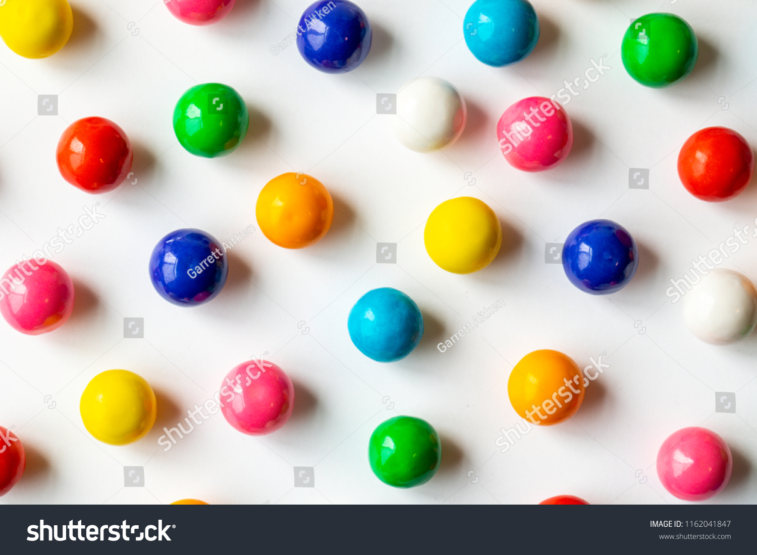 A variety of gumballs with different colors shot on a white background #1162041847