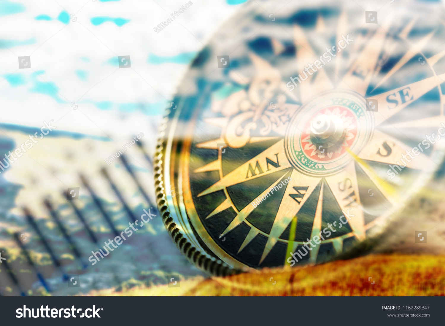 Brass antique compass  on background #1162289347