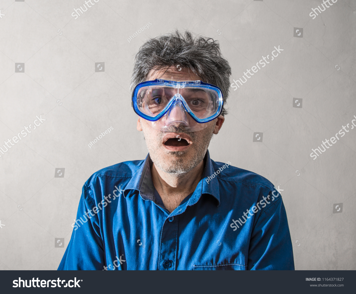 a man having a scuba mask #1164371827