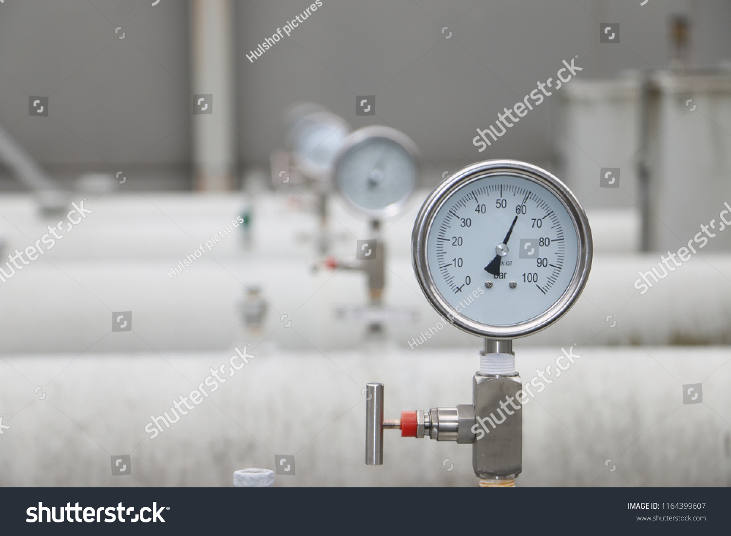 measuring the pressure on the manometer or pressure gauge industrial #1164399607